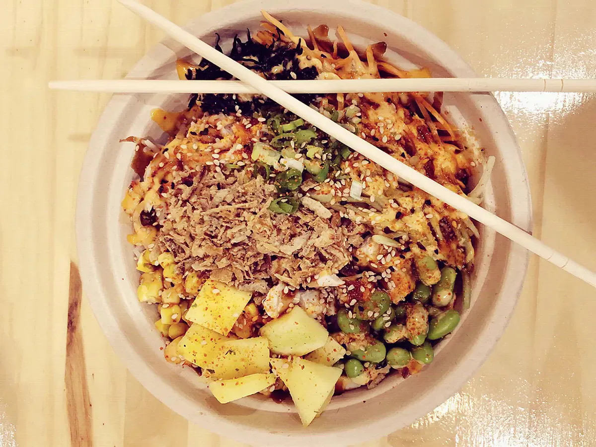 Spicy poke bowl with pineapple, edamame, and sesame seeds at Pokéloha, a Asian Fusion Restaurant in Woonsocket