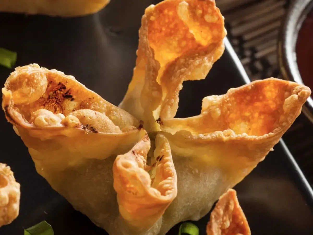 Crispy fried dumplings, golden - brown and ready for dipping at Pokéloha, a Asian Fusion Restaurant in Woonsocket