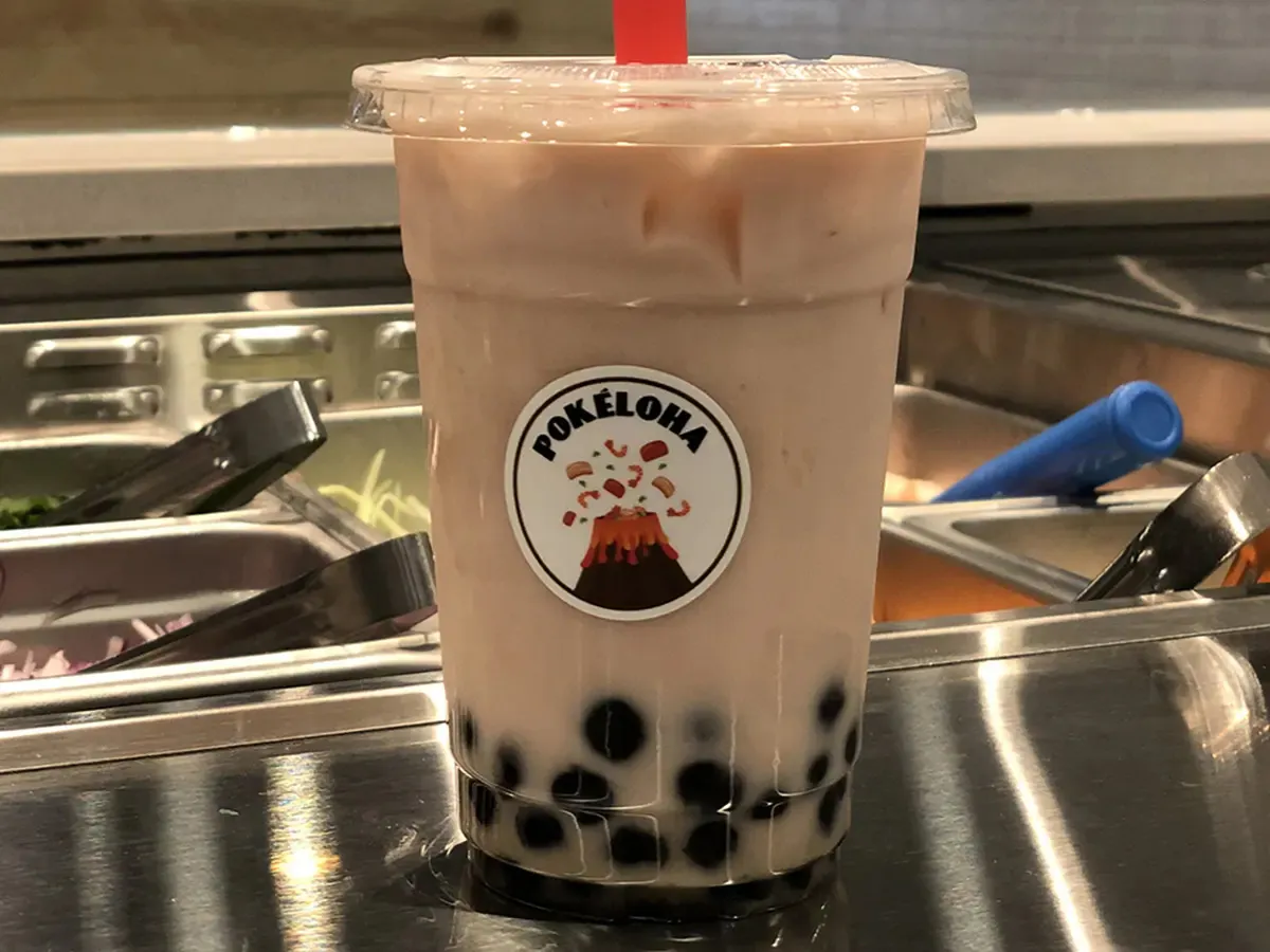 Bubble tea with chewy tapioca pearls in a plastic cup at Pokéloha, a Asian Fusion Restaurant in Woonsocket